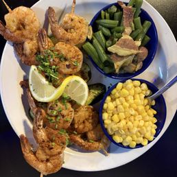 Cajun Shrimp hidden underneath that is zucchini, corn & green beans