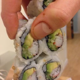 Mushy Sushi that stuck together when held up. Teriyaki Yummy says this happens when the rice is really "Fresh".  Gross