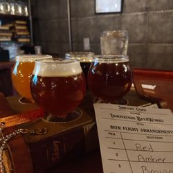 Innovation Beerworks - Their flight board is carved out book. Normally I would not approve damaging Tolstoy, but this pretty innovative (see.what I did there)