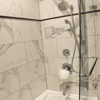 Shelton Tile and Flooring - a bathtub and shower - Flooring Near Me - Johnson City, Tennessee Shelton Tile and Flooring - a bathtub and shower - Flooring Near Me - Johnson City, Tennessee