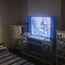 Maddy's Home Furniture - The chest on both sides of the fire place is white my fire place is silver with mirrors that is what these chest dressers are supposed to be