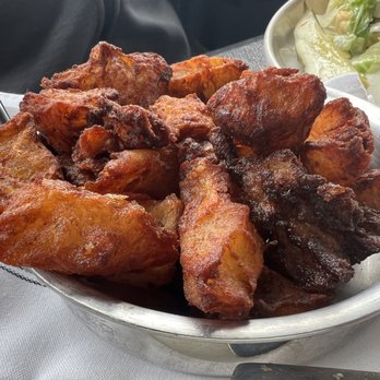 Showroom - Garlic home fries, fried a little too hard. - New American Near Me - Frederick, Maryland