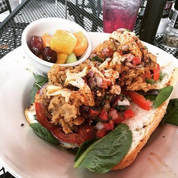 Sunset Grill - Oyster Poboy with side fruit - American Near Me - Fredericksburg, Texas
