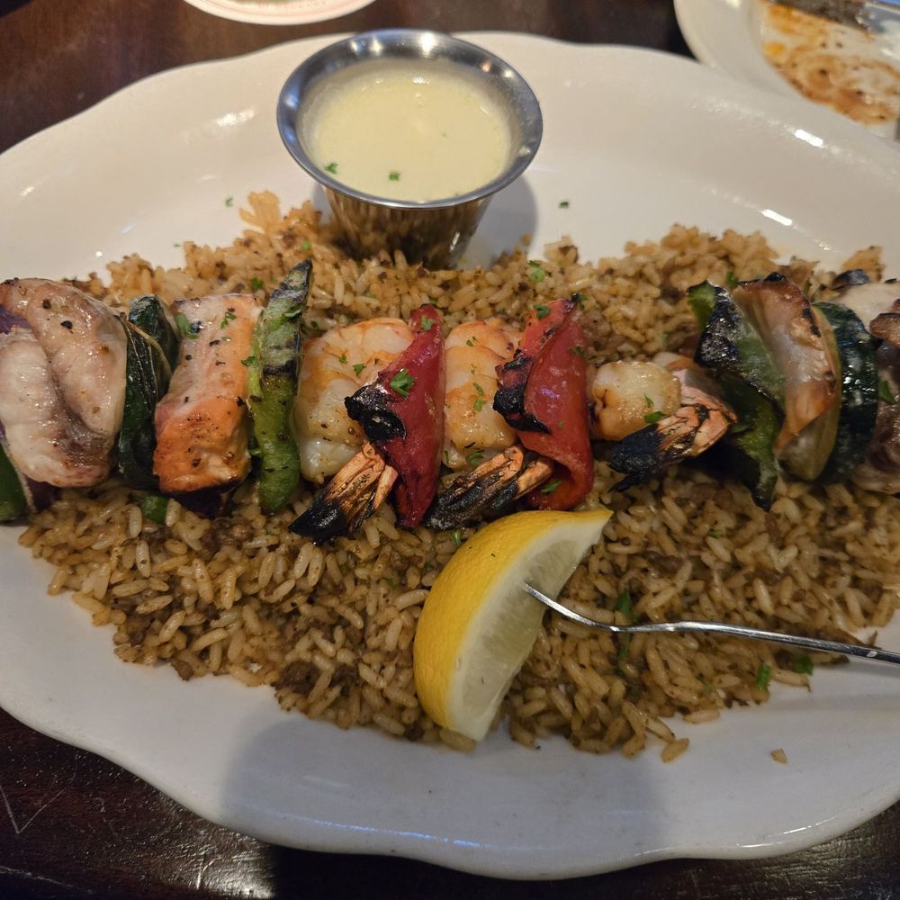 Pappadeaux Seafood Kitchen - Seafood skewer over dirty rice - Cajun/Creole Near Me - Westmont, Illinois