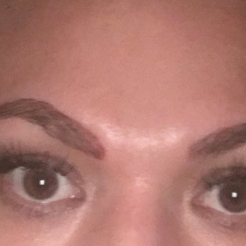 Chantel's Hair Studio - The eyebrow on the left in the photo goes too high, comes into the center too far and too low and is thicker than the brow on the right. - Hair Stylists Near Me - Puyallup, Washington