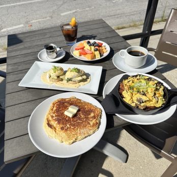 Parlor - Buttermilk Pancakes Eggs Benedict  Strange brew cocktail Potato and egg skillet  Side fruit - Pizza Near Me - Des Moines, Iowa