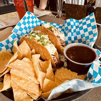 Buzzrock Brewing Co. - Tacos platter (note the forearm in the background) - Breweries Near Me - Torrance, California Buzzrock Brewing Co. - Tacos platter (note the forearm in the background) - Breweries Near Me - Torrance, California