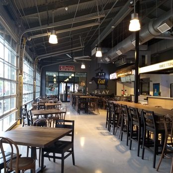 Halcyon - Kilwins for chocolate or icecream.  Various seating options for dining in the market hall. - Shopping Centers Near Me - Alpharetta, Georgia