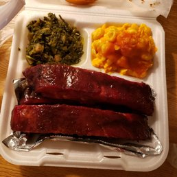 a tray of meat and vegetables