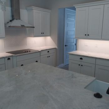 M.A Tile & Flooring - a kitchen with white cabinets - Flooring Near Me M.A Tile & Flooring - a kitchen with white cabinets - Flooring Near Me