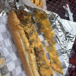 Philly cheesesteak cheese whiz, garlic aïoli Philly cheesesteak cheese whiz, garlic aïoli