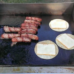 Tacos El Bandido - Bacon wrapped hot dogs and signature quesadillas.