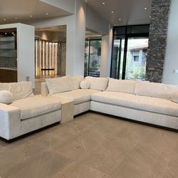 Made of multiple connected upholstered pieces that allow for customization