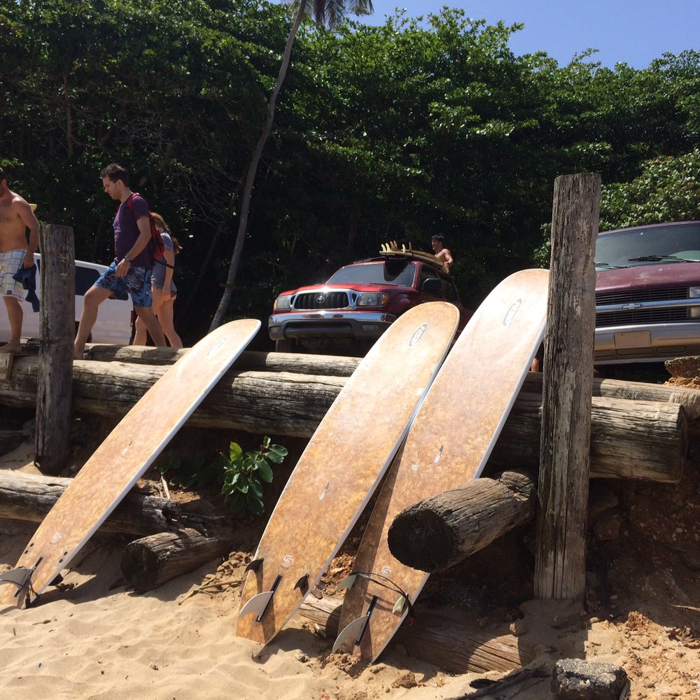 Rincon Surf School - Just arriving. Instructors take the boards down and prep - Surf Schools Near Me - Rincon, Puerto Rico