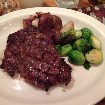 Baci Bistro - The special: ribeye steak with potatoes and brussels sprouts. - Italian Near Me - Kailua, Hawaii