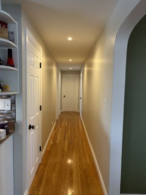 hallway renovation - This hallway was completely renovated: removed popcorn ceiling, plastered wall refinished, lights installed, new trim, 5 prehung doors replaced . hallway renovation - This hallway was completely renovated: removed popcorn ceiling, plastered wall refinished, lights installed, new trim, 5 prehung doors replaced .