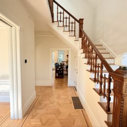 Refinished parquet floors and staircase. Refinished parquet floors and staircase.