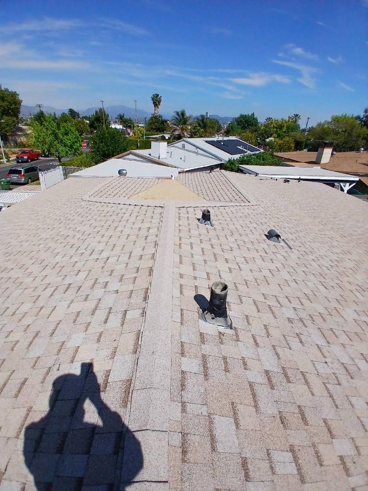 Slide of Reliance Roofing