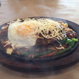 Veal with fried egg. Looks way better than it tastes. Veal with fried egg. Looks way better than it tastes.