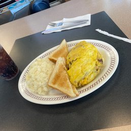 an omelet, toast, and rice on a plate
