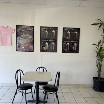 Sprinkles Donuts - a table and chairs - Donuts Near Me - Fresno, California
