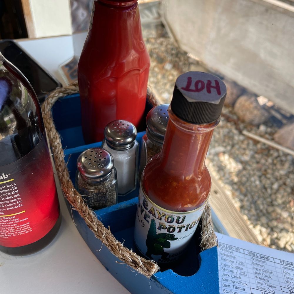 Don's Dock Seafood - a boat of condiments - Seafood Markets Near Me - Des Plaines, Illinois Don's Dock Seafood - a boat of condiments - Seafood Markets Near Me - Des Plaines, Illinois