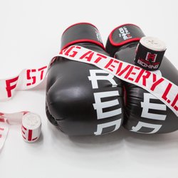 We've got you hooked up! We have gloves and wraps waiting for you at your free first class!