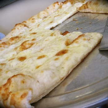 Frank's Place - Sicilian cheesy bread is a must have. So good. - Pizza Near Me - Manchester, Michigan