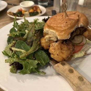 Wheat Penny Oven and Bar - Cauliflower burger with spring salad roasted garlic dressing - Pizza Near Me - Dayton, Ohio Wheat Penny Oven and Bar - Cauliflower burger with spring salad roasted garlic dressing - Pizza Near Me - Dayton, Ohio