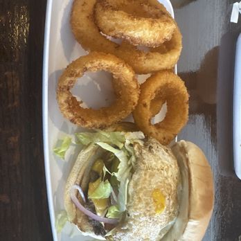 The Burger Spot - Bacon Cheeseburger with Fried Egg and Onion Rings - Burgers Near Me - Waxahachie, Texas The Burger Spot - Bacon Cheeseburger with Fried Egg and Onion Rings - Burgers Near Me - Waxahachie, Texas
