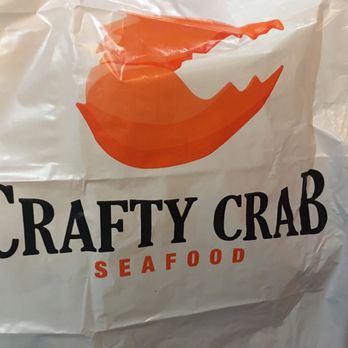 Crafty Crab - 2 plastic gloves and a crafty apron - Seafood Near Me - West Melbourne, Florida