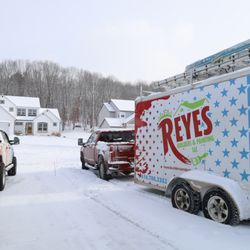 Reyes Builders & Painting - Company vehicles at worksite