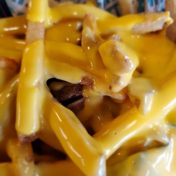 Wingstop - Fries with cheese sauce! - Chicken Wings Near Me - Baytown, Texas