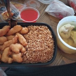 Sweet and sour chicken combination dinner with wonton soup. Sweet and sour chicken combination dinner with wonton soup.