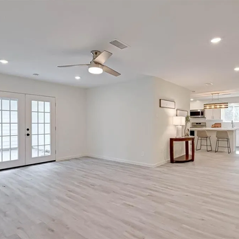 New Sun Construction - open living room and kitchen - Painters Near Me