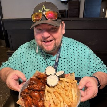 Sonny's BBQ - My brother Jonathan with his BBQ Wings Platter and fries - Barbeque Near Me - Lakeland, Florida