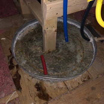 Mainstream Services - The 2x4 leg in the drain pan they built. - Plumbing Near Me - Georgetown, Texas
