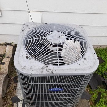 Power Home Remodeling - Our AC and backyard after.   Notice the material to the right and the crap that fell in our AC.  They came and cleaned after I complained. - Windows Installation Near Me - Houston, Texas