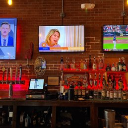 a television and a bar a television and a bar