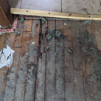 Fayton's Floors - Termite damage in dining room - Flooring Near Me