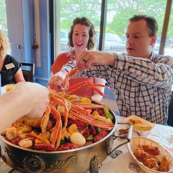 Million's Crab Boiled Seafood - Happy foursome - Seafood Near Me - Toledo, Ohio Million's Crab Boiled Seafood - Happy foursome - Seafood Near Me - Toledo, Ohio