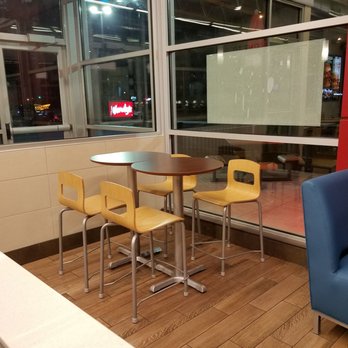 Wendy's - a table and chairs in front of a window - Fast Food Near Me - Aurora, Illinois Wendy's - a table and chairs in front of a window - Fast Food Near Me - Aurora, Illinois