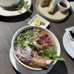 SAIGON DISTRICT ASIAN FUSION - The Delux Pho: angus rib, rare ribeye, meatballs.