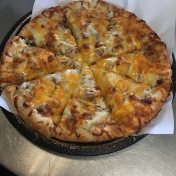 Tonios Pizza - a cheese pizza on a pan - Pizza Near Me - Litchfield, Ohio Tonios Pizza - a cheese pizza on a pan - Pizza Near Me - Litchfield, Ohio