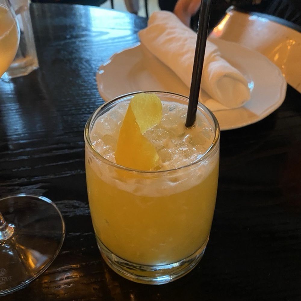 Goodwin’s - Ginger Peach Sour (nonalcoholic) at Goodwins Dallas - Cocktail Bars Near Me - Dallas, Texas Goodwin’s - Ginger Peach Sour (nonalcoholic) at Goodwins Dallas - Cocktail Bars Near Me - Dallas, Texas