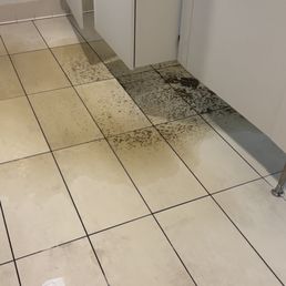 Overflowing toilet in the lobby- about sums up the level of service at this hotel.