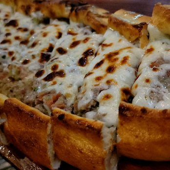 Sultan's Kebab - The Beef & Lamb Pide, add Cheese. Absolutely delicious, dip in garlic dill yogurt! - Mediterranean Near Me - Pleasanton, California Sultan's Kebab - The Beef & Lamb Pide, add Cheese. Absolutely delicious, dip in garlic dill yogurt! - Mediterranean Near Me - Pleasanton, California
