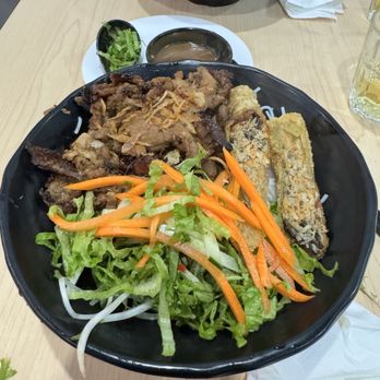 Viet Mama Cafe - V6 - grilled pork and spring roll vermicelli bowl. - Vietnamese Near Me - Vancouver, British Columbia Viet Mama Cafe - V6 - grilled pork and spring roll vermicelli bowl. - Vietnamese Near Me - Vancouver, British Columbia