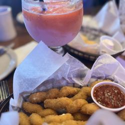 Texas Roadhouse - Mozzarella cheese curls with marinara sauce