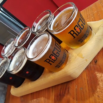Rogue Spirits Sunset Bar - Flight of beers. - Bars Near Me - Newport, Oregon